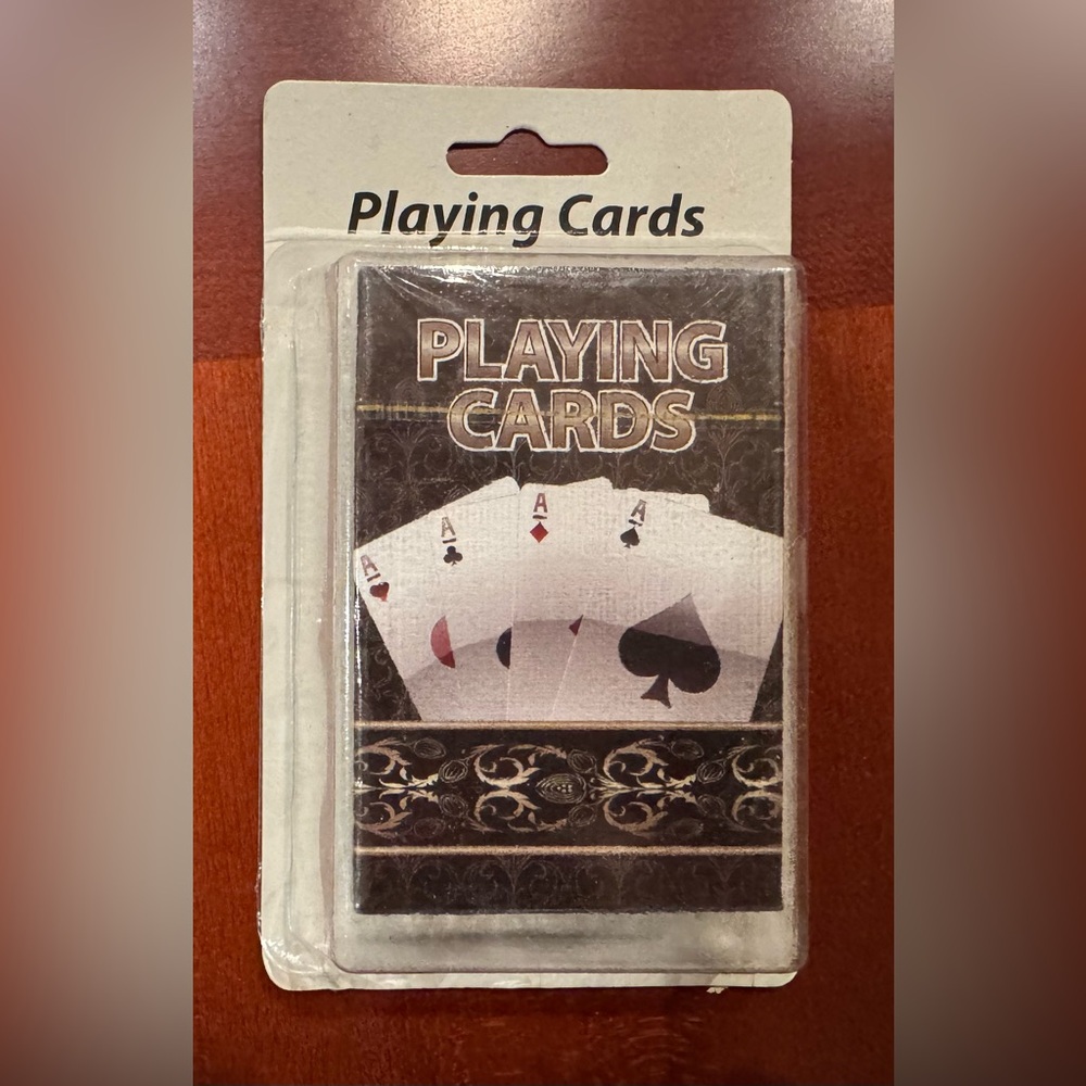 DECK OF PLAYING CARDS - plastic coated. Brand new in original packaging